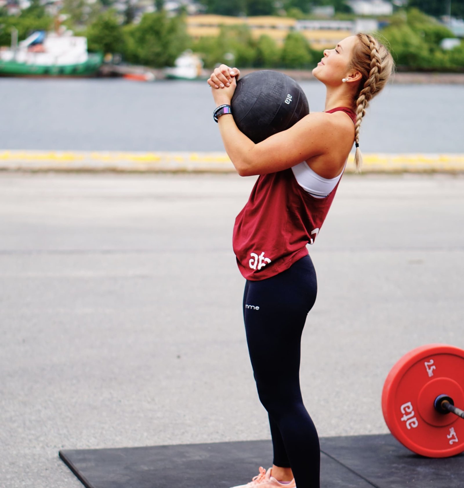 Woman Lifting Heavy Ball Woman Lifting Heavy Ball